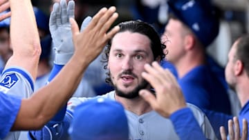 Apr 30, 2025; St. Petersburg, Florida, USA; Kansas City Royals first baseman Vinnie Pasquantino (9) celebrates with his teammates after hitting a two-run home run in the first inning against the Tampa Bay Rays at George M. Steinbrenner Field. Mandatory Credit: Jonathan Dyer-Imagn Images