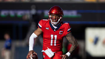 Nov 30, 2024; Tucson, Arizona, USA; Arizona Wildcats quarterback Noah Fifita (11) against the Arizona State Sun Devils during the Territorial Cup at Arizona Stadium. Mandatory Credit: Mark J. Rebilas-Imagn Images