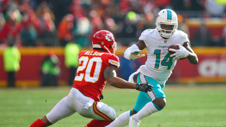 Miami Dolphins wide receiver Jarvis Landry (14) runs against Kansas City Chiefs cornerback Steven Nelson (20) in the first half at Arrowhead Stadium in 2017.