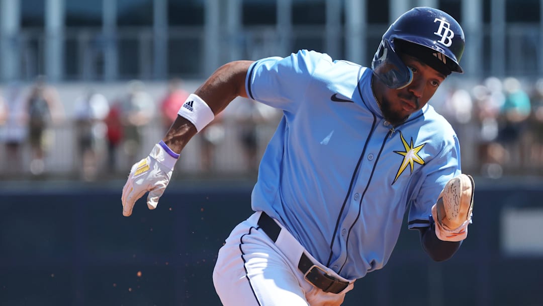 Mar 15, 2025; Port Charlotte, Florida, USA; Tampa Bay Rays outfielder Chandler Simpson (96) runs home to score a run during the third inning against the New York Yankees at Charlotte Sports Park. Mar 15, 2025; Port Charlotte, Florida, USA; Tampa Bay Rays outfielder Chandler Simpson (96) runs home to score a run during the third inning against the New York Yankees at Charlotte Sports Park.