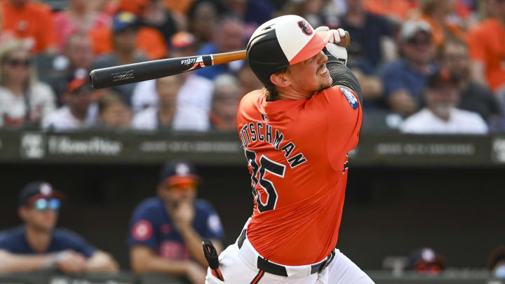 Aug 24, 2024; Baltimore, Maryland, USA; Baltimore Orioles catcher Adley Rutschman hits a double.