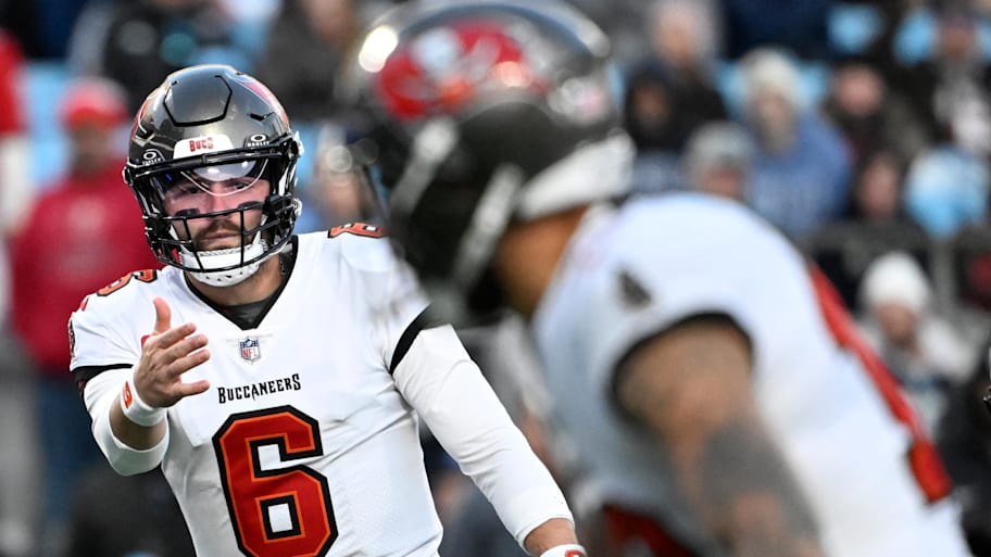 Dec 1, 2024; Charlotte, North Carolina, USA;  Tampa Bay Buccaneers quarterback Baker Mayfield (6) signals to wide receiver Mike Evans (13) in the first quarter at Bank of America Stadium. Mandatory Credit: Bob Donnan-Imagn Images | Bob Donnan-Imagn Images