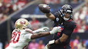 Oct 26, 2025; Houston, Texas, USA; San Francisco 49ers cornerback Upton Stout (20) attempts to sack Houston Texans quarterback C.J. Stroud (7) during the fourth quarter at NRG Stadium. Mandatory Credit: Troy Taormina-Imagn Images