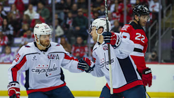 Andrew Mangiapane, Nic Dowd, Washington Capitals Mandatory Credit: Thomas Salus-Imagn Images