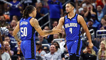 Jan 20, 2023; Orlando, Florida, USA; Orlando Magic guard Jalen Suggs (4) is congratulated by guard Cole Anthony (50) against the New Orleans Pelicans during the second half at Amway Center. Mandatory Credit: Kim Klement-Imagn Images