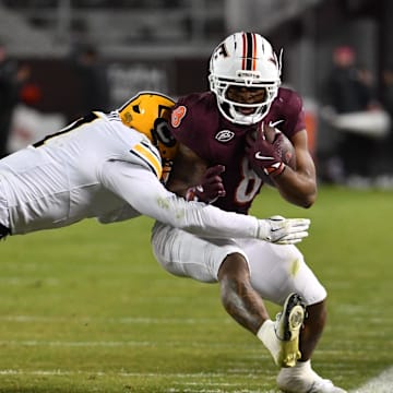 Oct 24, 2025; Blacksburg, Va.; California linebacker Harrison Taggart (7) tackles Virginia Tech running back Terion Stewart (8) during the third quarter.