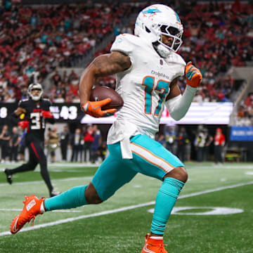 Miami Dolphins wide receiver Jaylen Waddle (17) scores a touchdown against the Atlanta Falcons in the third quarter at Mercedes-Benz Stadium.