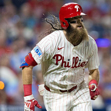 Sep 11, 2024; Philadelphia, Pennsylvania, USA; Philadelphia Phillies outfielder Brandon Marsh (16) runs the bases after hitting a single during the sixth inning against the Tampa Bay Rays at Citizens Bank Park