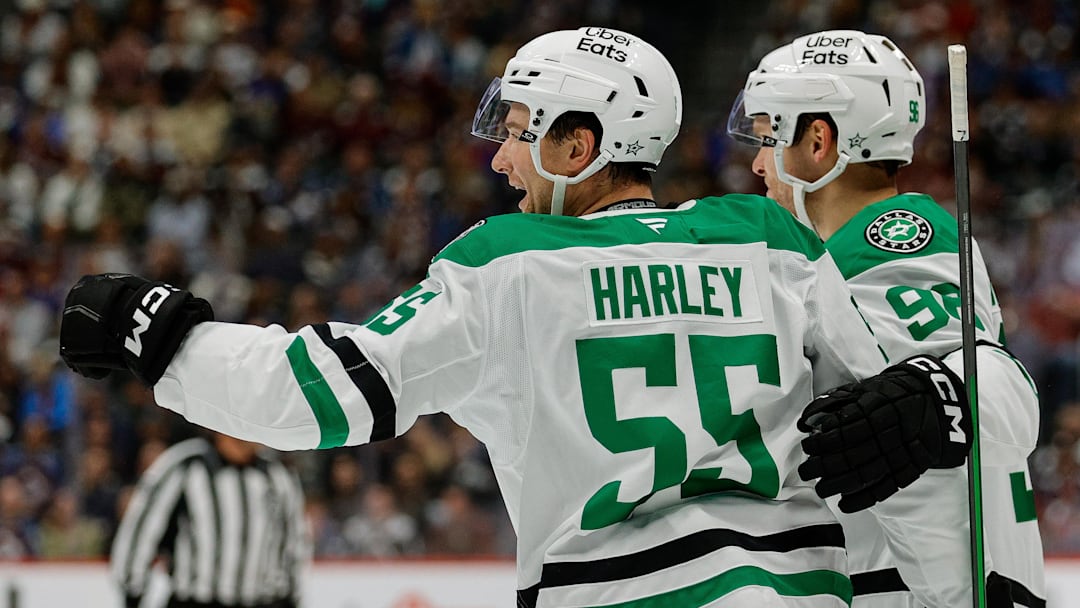 Oct 11, 2025; Denver, Colorado, USA; Dallas Stars defenseman Thomas Harley (55) celebrates his goal with right wing Mikko Rantanen (96) in the first period against the Colorado Avalanche at Ball Arena. Mandatory Credit: Isaiah J. Downing-Imagn Images