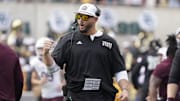 Sep 2, 2023; Waco, Texas, USA; Texas State Bobcats head coach G.J. Kinne reacts after a touchdown against the Baylor Bears during the first half at McLane Stadium. Mandatory Credit: Raymond Carlin III-Imagn Images