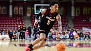 Feb 5, 2025; Chestnut Hill, Massachusetts, USA; Louisville Cardinals guard Terrence Edwards Jr. (5) controls the ball during the first half against the Boston College Eagles at Conte Forum. 