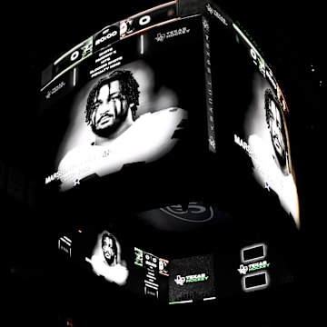 The Dallas Stars and Anaheim Ducks observe a moment of silence to honor the memory of Dallas Cowboys DE Marshawn Kneeland 