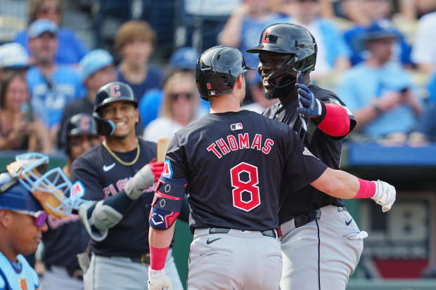 Lane Thomas celebrates after hitting a home run 