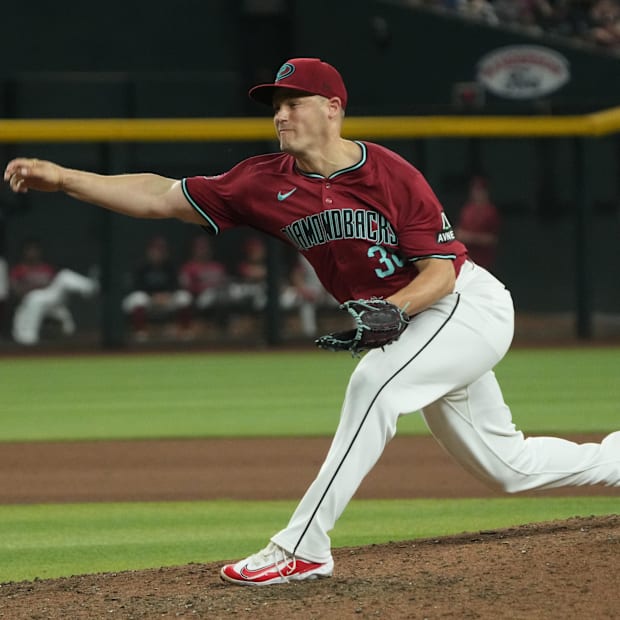 Paul Sewald throws a pitch 