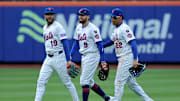Apr 4, 2025; New York City, New York, USA; New York Mets center fielder Jose Siri (19) and left fielder Brandon Nimmo (9) and right fielder Juan Soto (22) celebrate after defeating the Toronto Blue Jays during the ninth inning at Citi Field. Mandatory Credit: Brad Penner-Imagn Images