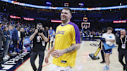 Apr 6, 2025; Oklahoma City, Oklahoma, USA; Los Angeles Lakers guard Luka Doncic (77) runs off the court after his team beat the Oklahoma City Thunder during the second half at Paycom Center. Mandatory Credit: Alonzo Adams-Imagn Images