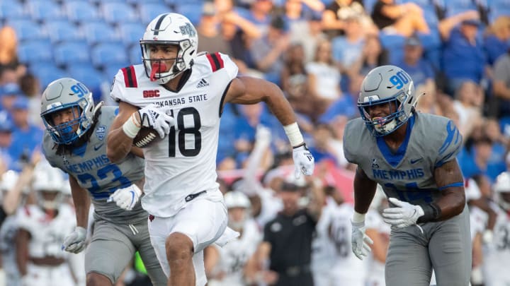 Memphis Tigers defensive back Ladarian Paulk (23) and Memphis Tigers linebacker Davian Mayo (14) follow Arkansas State Red Wolves tight end Seydou Traore (18) as he runs the ball into the end zone during the first half of a Memphis Tigers game against the Arkansas State Red Wolves on Saturday, Sept. 17, 2022.