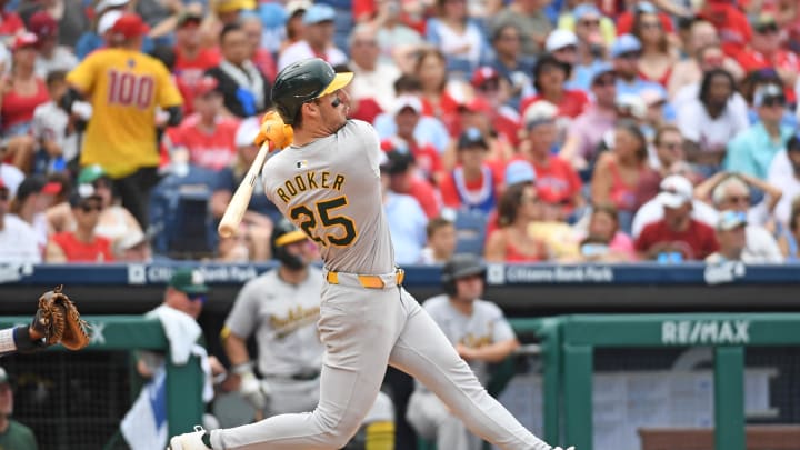 Jul 14, 2024; Philadelphia, Pennsylvania, USA; Oakland Athletics outfielder Brent Rooker (25) hits a two-run home run against the Philadelphia Phillies during the sixth inning at Citizens Bank Park. Mandatory Credit: Eric Hartline-USA TODAY Sports