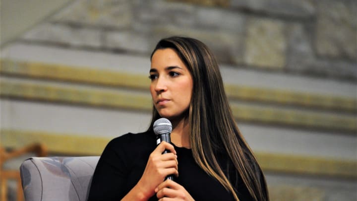 Olympic gymnast Aly Raisman speaks to a sold-out crowd about her gymnastics career and her experience as a sexual assault survivor during an event at Congregation Shalom on Nov. 13.