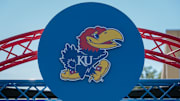 Oct 1, 2022; Lawrence, Kansas, USA; Kansas Jayhawks logo at entrance to the field prior to the game between the Kansas Jayhawks and the Iowa State Cyclones at David Booth Kansas Memorial Stadium. Mandatory Credit: William Purnell-Imagn Images