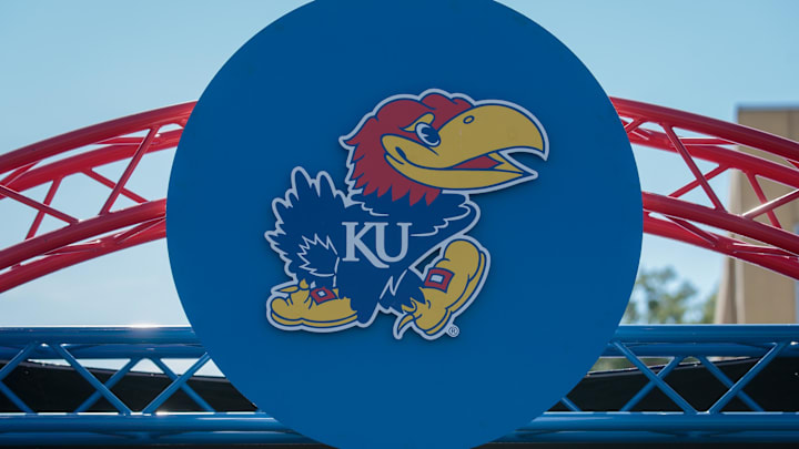 Oct 1, 2022; Lawrence, Kansas, USA; Kansas Jayhawks logo at entrance to the field prior to the game between the Kansas Jayhawks and the Iowa State Cyclones at David Booth Kansas Memorial Stadium. Mandatory Credit: William Purnell-Imagn Images