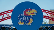 Oct 1, 2022; Lawrence, Kansas, USA; Kansas Jayhawks logo at entrance to the field prior to the game between the Kansas Jayhawks and the Iowa State Cyclones at David Booth Kansas Memorial Stadium. 