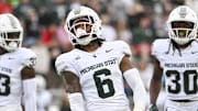 Sep 7, 2024; College Park, Maryland, USA;  Michigan State Spartans defensive back Ade Willie (6) reacts after tackling Maryland Terrapins wide receiver Braeden Wisloski (19) on a first half kickoff return at SECU Stadium. Mandatory Credit: Tommy Gilligan-Imagn Images