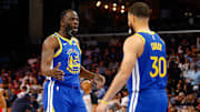 Apr 1, 2025; Memphis, Tennessee, USA; Golden State Warriors forward Draymond Green (23) reacts with guard Stephen Curry (30) prior to the game against the Memphis Grizzlies at FedExForum. Mandatory Credit: Petre Thomas-Imagn Images