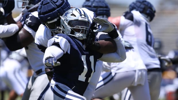 Dallas Cowboys linebacker Micah Parsons (11) rushes during training camp at the River Ridge Playing Fields in Oxnard, Califor