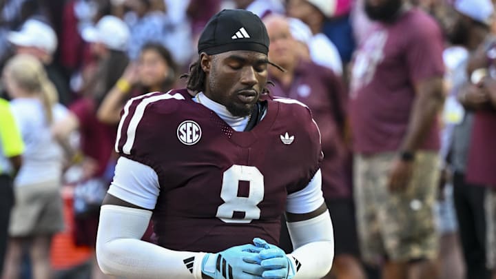 Oct 11, 2025; College Station, Texas, USA; Texas A&M Aggies running back Le'Veon Moss (8) takes a moment prior to the game against the Florida Gators at Kyle Field. Mandatory Credit: Maria Lysaker-Imagn Images 