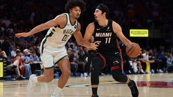 Mar 12, 2026; Miami, Florida, USA; Miami Heat forward Jaime Jaquez Jr. (11) drives to the basket against Milwaukee Bucks center Jericho Sims (00) during the third quarter at Kaseya Center. Mandatory Credit: Sam Navarro-Imagn Images