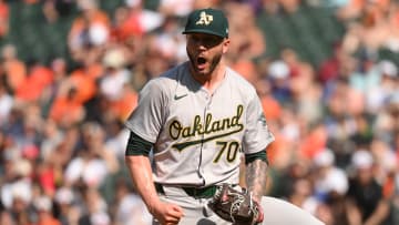 Apr 28, 2024; Baltimore, Maryland, USA;  Oakland Athletics relief pitcher Lucas Erceg (70) reacts to a strikeout to end the game during the ninth inning against the Oakland Athletics at Oriole Park at Camden Yards. Mandatory Credit: James A. Pittman-USA TODAY Sports