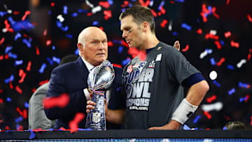 Fox television announcer Terry Bradshaw presents New England Patriots quarterback Tom Brady with the Vince Lombardi trophy after defeating the Atlanta Falcons during Super Bowl LI at NRG Stadium. 