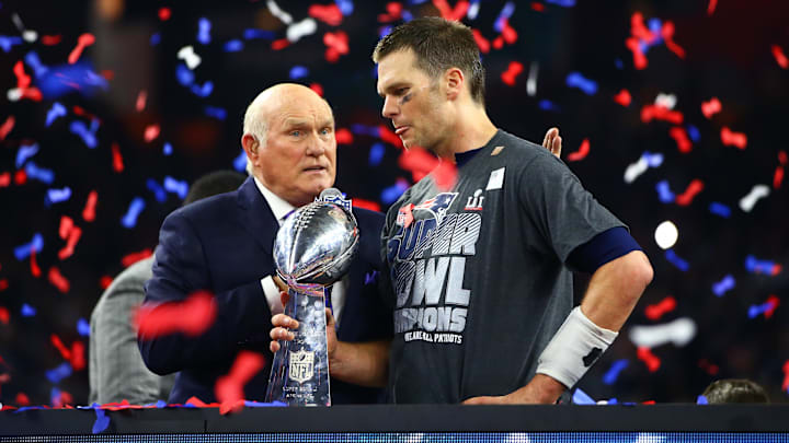 Fox television announcer Terry Bradshaw presents New England Patriots quarterback Tom Brady with the Vince Lombardi trophy after defeating the Atlanta Falcons during Super Bowl LI at NRG Stadium. Fox television announcer Terry Bradshaw presents New England Patriots quarterback Tom Brady with the Vince Lombardi trophy after defeating the Atlanta Falcons during Super Bowl LI at NRG Stadium.