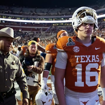 Dec 21, 2024; Austin, Texas, USA; Texas Longhorns quarterback Arch Manning (16) against the Clemson Tigers during the CFP National playoff first round at Darrell K Royal-Texas Memorial Stadium. Mandatory Credit: Mark J. Rebilas-Imagn Images