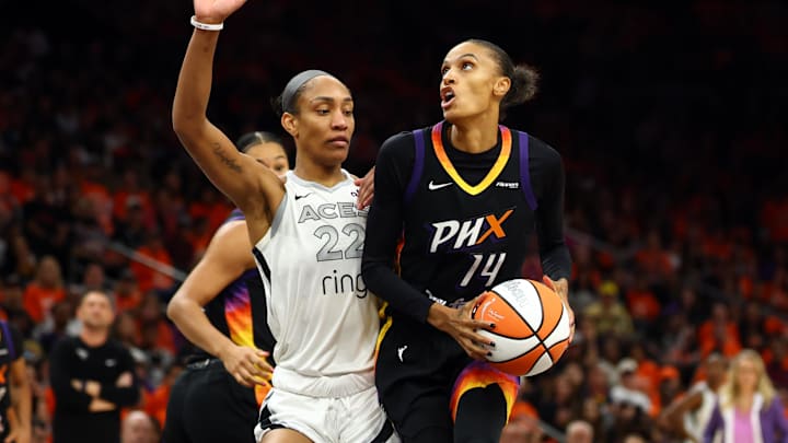 Oct 8, 2025; Phoenix, Arizona, USA; Las Vegas Aces center A'ja Wilson (22) against Phoenix Mercury forward DeWanna Bonner (14) during game three of the 2025 WNBA Finals at PHX Arena. Mandatory Credit: Mark J. Rebilas-Imagn Images Oct 8, 2025; Phoenix, Arizona, USA; Las Vegas Aces center A'ja Wilson (22) against Phoenix Mercury forward DeWanna Bonner (14) during game three of the 2025 WNBA Finals at PHX Arena. Mandatory Credit: Mark J. Rebilas-Imagn Images