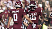 Texas A&M Aggies quarterback Marcel Reed celebrates with wide receiver Izaiah Williams after an Aggies touchdown during the third quarter against the South Carolina Gamecocks at Kyle Field.