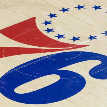 Mar 5, 2019; Philadelphia, PA, USA; Philadelphia 76ers guard Ben Simmons (25) stands by the center court logo during the third quarter against the Orlando Magic at Wells Fargo Center. Mandatory Credit: Bill Streicher-USA TODAY Sports