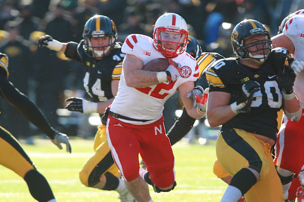 Nebraska Cornhuskers running back Rex Burkhead (22) carries the football against the Iowa Hawkeyes at Kinnick Stadium.