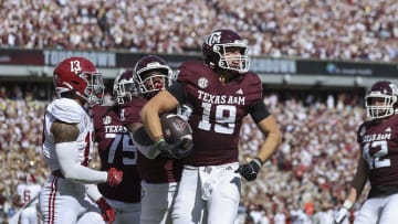 Oct 7, 2023; College Station, Texas, USA; Texas A&M Aggies tight end Jake Johnson (19) celebrates after scoring a touchdown during the second quarter against the Alabama Crimson Tide at Kyle Field. Mandatory Credit: Troy Taormina-USA TODAY Sports