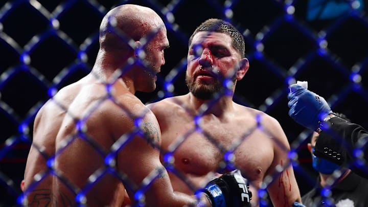 Robbie Lawler meets with Nick Diaz following his TKO victory during UFC 266 at T-Mobile Arena Robbie Lawler meets with Nick Diaz following his TKO victory during UFC 266 at T-Mobile Arena