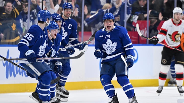 Apr 22, 2025; Toronto, Ontario, CAN;  Toronto Maple Leafs forward Max Domi (11) celebrates with team mates after scoring the winning goal in overtime against the Ottawa Senators in game two of the first round of the 2025 Stanley Cup Playoffs at Scotiabank Arena. Mandatory Credit: Dan Hamilton-Imagn Images