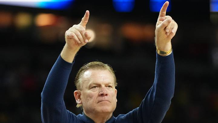 Apr 4, 2026; Indianapolis, IN, USA;  Illinois Fighting Illini head coach Brad Underwood reacts against the Connecticut Huskies in the second half during a semifinal of the Final Four of the men's 2026 NCAA Tournament at Lucas Oil Stadium. Mandatory Credit: Robert Deutsch-Imagn Images