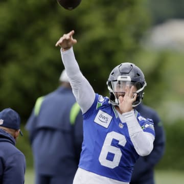 Seattle Seahawks quarterback Sam Howell makes a pass during an NFL football practice, Wednesday, May 22, 2024, in Renton, Wash.