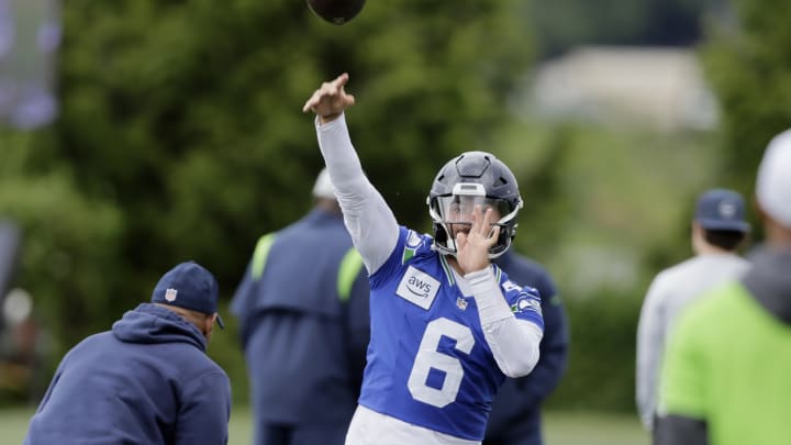 Seattle Seahawks quarterback Sam Howell makes a pass during an NFL football practice, Wednesday, May 22, 2024, in Renton, Wash.