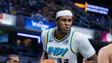 Nov 24, 2024; Indianapolis, Indiana, USA; Indiana Pacers center Myles Turner (33) rebounds the ball in the second half against the Washington Wizards at Gainbridge Fieldhouse. Mandatory Credit: Trevor Ruszkowski-Imagn Images