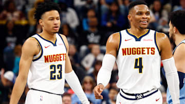 Nov 19, 2024; Memphis, Tennessee, USA; Denver Nuggets guard Trey Alexander (23) and guard Russell Westbrook (4) react after a foul call during the second half against the Memphis Grizzlies at FedExForum. Mandatory Credit: Petre Thomas-Imagn Images