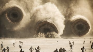 Sandworms crash through the deserts of Arrakis toward an army in Dune: Part Two.
