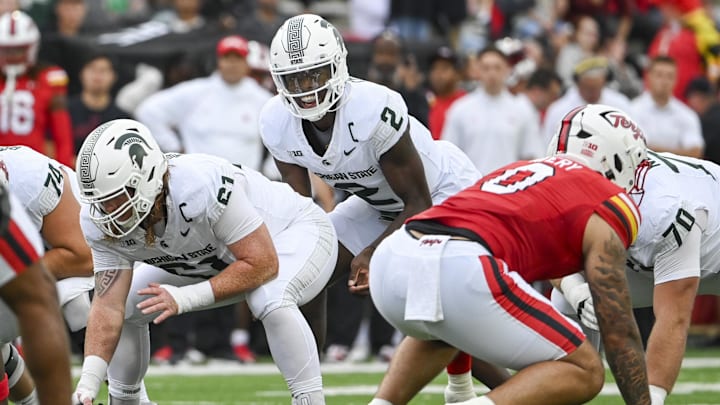 Sep 7, 2024; College Park, Maryland, USA; Michigan State Spartans quarterback Aidan Chiles (2) calls a p[lay at the line during the first quarter against the Maryland Terrapins  at SECU Stadium. Mandatory Credit: Tommy Gilligan-Imagn Images