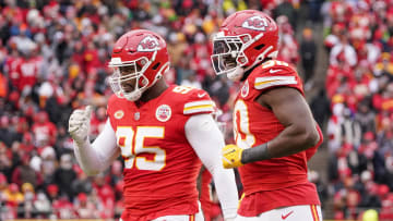 Dec 25, 2023; Kansas City, Missouri, USA; Kansas City Chiefs defensive end Charles Omenihu (90) celebrates with defensive tackle Chris Jones (95) after a play against the Las Vegas Raiders during the game at GEHA Field at Arrowhead Stadium. Mandatory Credit: Denny Medley-USA TODAY Sports